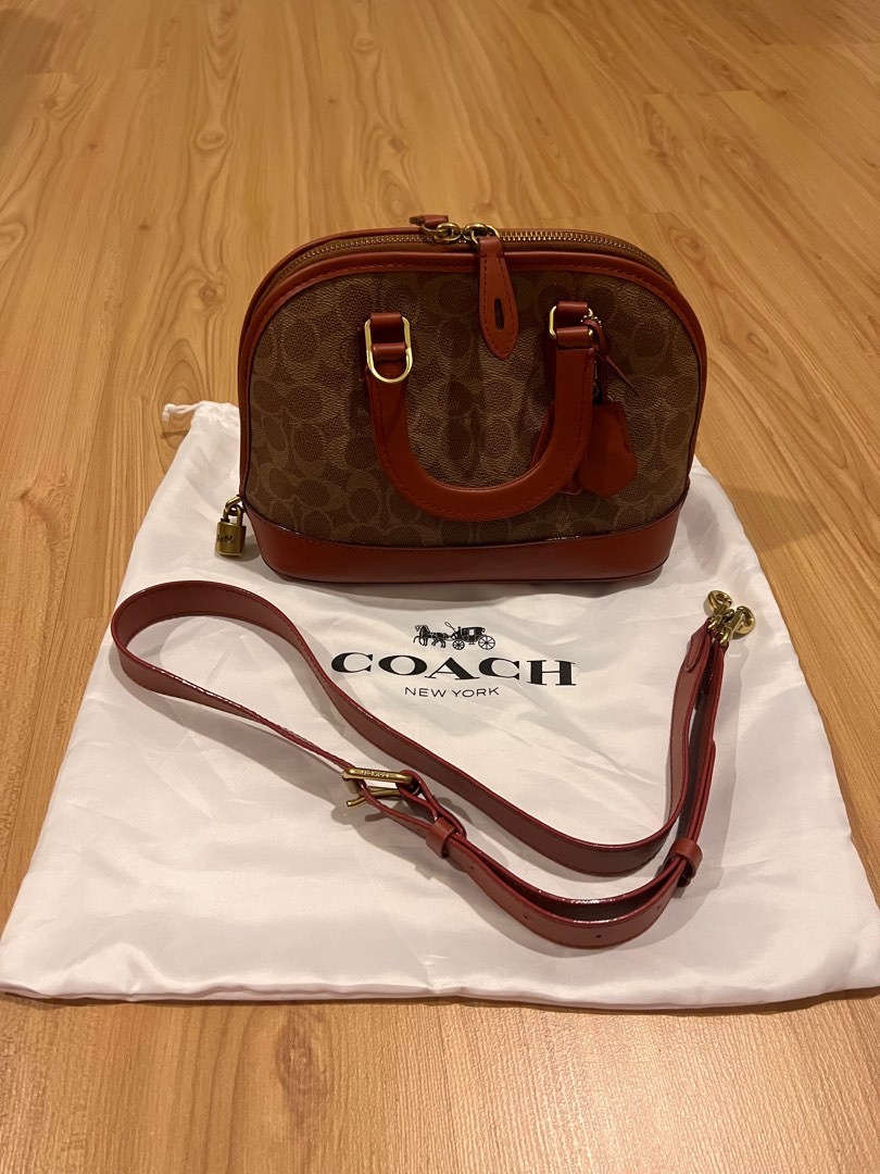 COACH Revel Bag In Signature Canvas in Brown
