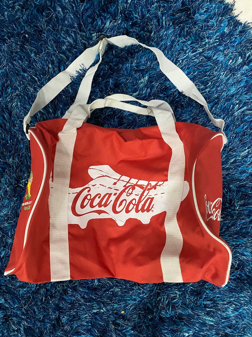 Coca cola duffle, Men's Fashion, Bags, Backpacks on Carousell