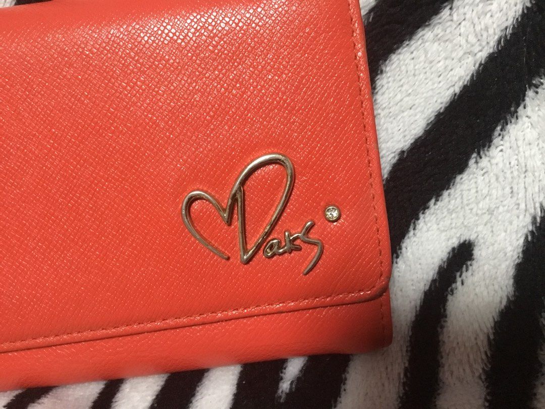 ALL MUST GO BEFORE APRIL 15!!!DAKS RARE DESIGN (Category: Wallets & Card holders) located in Quezon City. Submitted by V_Cl0set (Listing ID 1220447201, Image 2). Description: in very good condition no rubs or scratches gold hardwares very unique design must buy!.