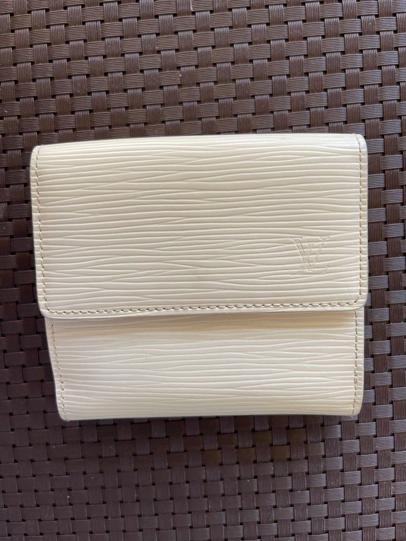 Louis Vuitton Epi Leather Trifold Wallet (Category: Luxury Bags & Wallets) located in Paranaque City. Submitted by shopjmac (Listing ID 1220358826, Image 2). Description: White LV trifold wallet in Epi leather 6 card slots + 2 interior pockets 1 Bill compartment Snap closure coin purse .