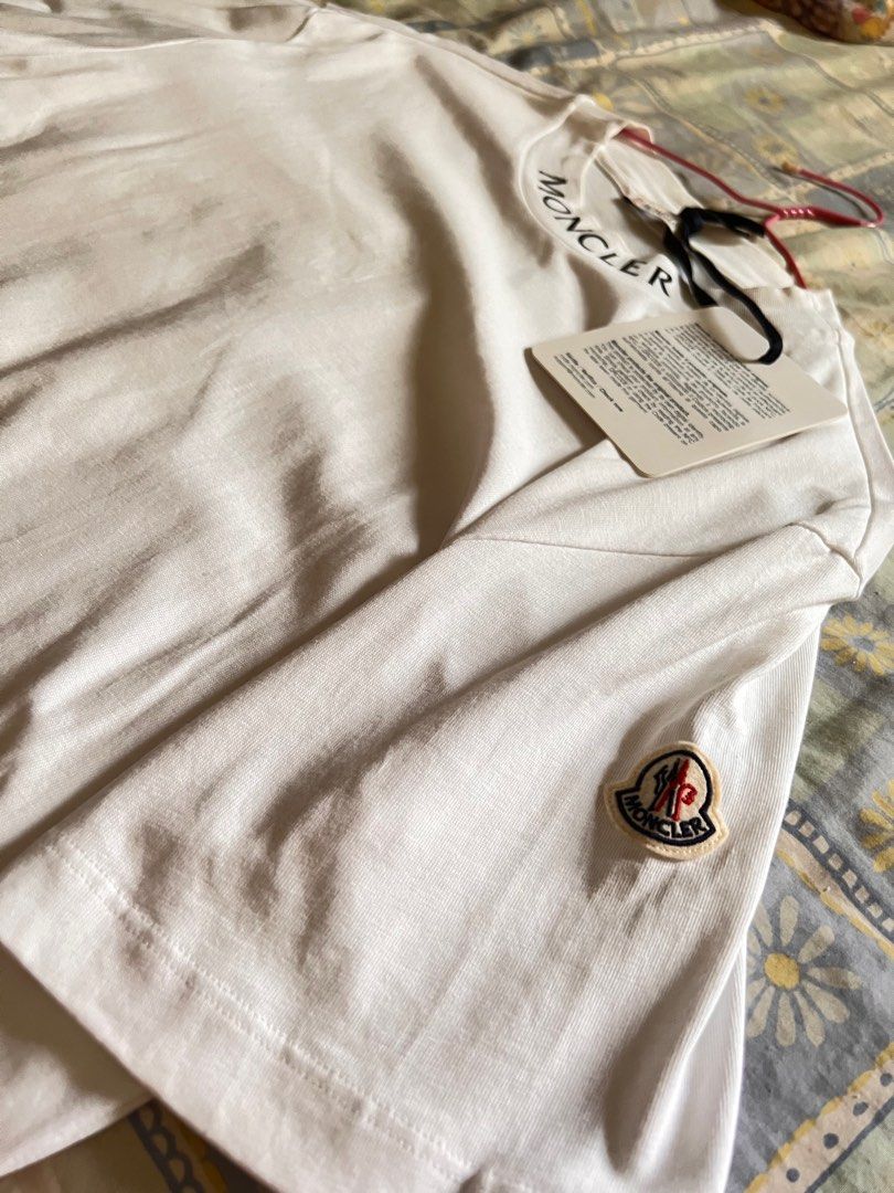 Moncler Basic Tshirt (Category: Apparel) located in Singapore. Submitted by goldbelly (Listing ID 1220495944, Image 2). Description: Impulsive buy, been in storage tag still on.