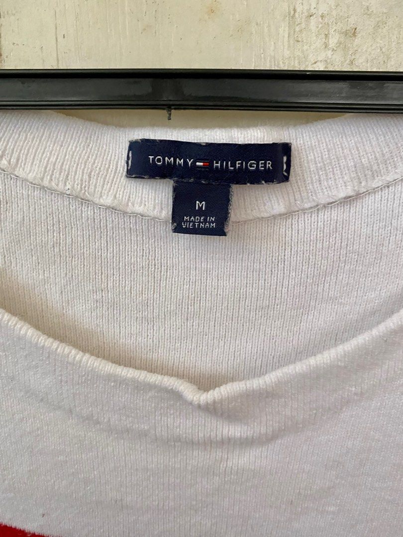 Original Tommy Hilfiger Knitted Sweater (Category: Longsleeves) located in Angono. Submitted by mclipio (Listing ID 1220354953, Image 2). Description: Original Tommy Hilfiger Knitted Sweater Material: Cotton Size: Medium - Original, bought in the US - Used once only - For Medium to Large body frame - Very good condition / No flaws Pick up or Delivery: c/o buyer thru Grab, Lalamove, Angkas, LBC or JRS Location: Makati / Rizal.