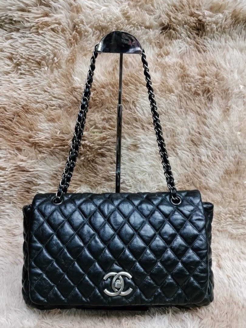Paris France  March 3 2020 Black leather Chanel chain bag   streetstylefw20 Stock Photo  Adobe Stock