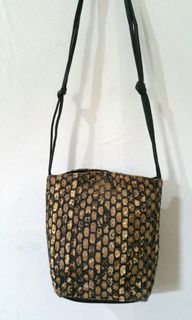 Snakeskin sling bag