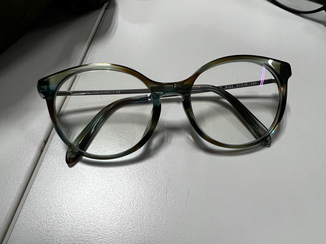 Tiffany frames (Category: Sunglasses & Eyewear) located in Putrajaya. Submitted by leena2020 (Listing ID 1220331722, Image 3). Description: Bought less than a year. Colour of frame is light turquoise mixed with brown. Lightly used as I have other glasses. Full set with original boxes. Price negotiable. Can COD in Suria KLCC if youd like to see if it suits you. Current lense with prescription for astigmatism, but you can certainly replace it with 