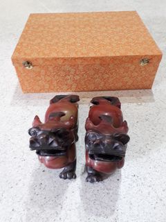 Vintage pair of Chinese stone guardian lions.