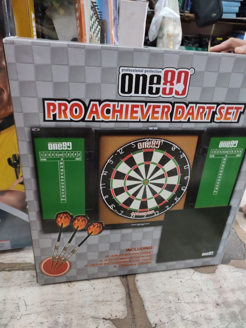 Dartboard Set with Cabinet (Category: Other Sports Equipment and Supplies) located in Manila. Submitted by min_yoongi (Listing ID 1220576203, Image 1). Description: Available ✓ ONE 80 PRO ACHIEVER DART SET INCLUDED: - Quality Wooden Cabinet - 18" x 1-1/2" Bristle Dartboard - 1 set of 20g Tungsten plated dart pin - 2 Chalks & 1 Eraser Pm for inquiries..