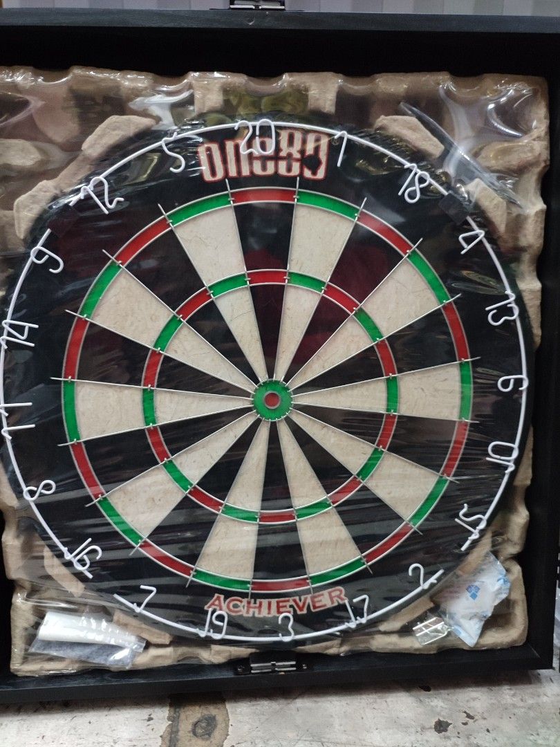 Dartboard Set with Cabinet (Category: Other Sports Equipment and Supplies) located in Manila. Submitted by min_yoongi (Listing ID 1220576203, Image 3). Description: Available ✓ ONE 80 PRO ACHIEVER DART SET INCLUDED: - Quality Wooden Cabinet - 18" x 1-1/2" Bristle Dartboard - 1 set of 20g Tungsten plated dart pin - 2 Chalks & 1 Eraser Pm for inquiries..