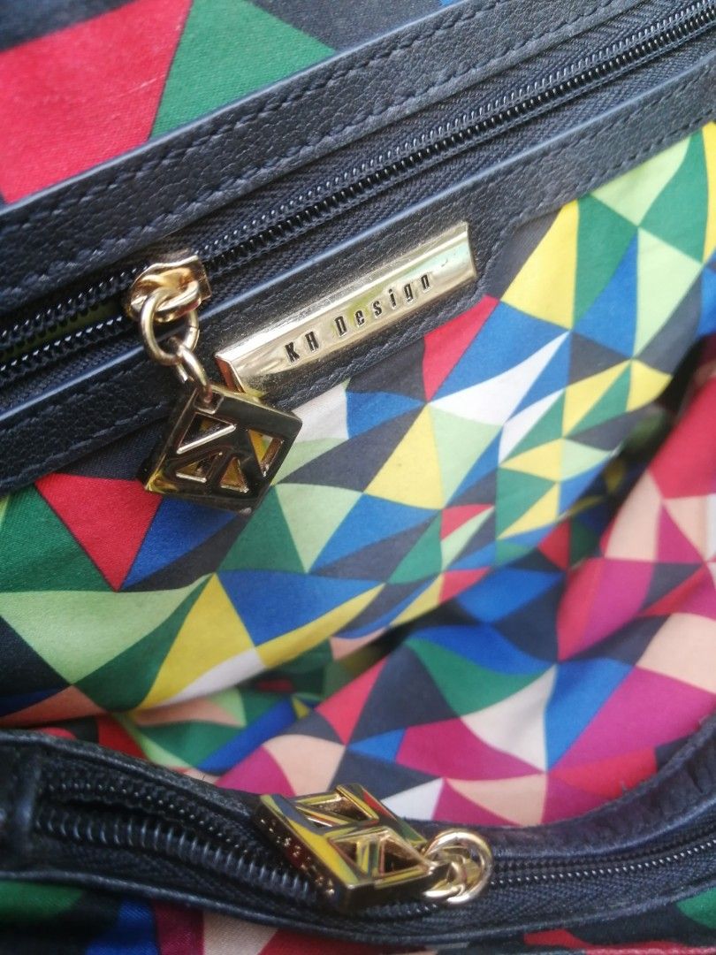 KH design crossbody Body Bag (Category: Cross-body Bags) located in Taguig. Submitted by lhet-lhet (Listing ID 1220555353, Image 3). Description: 💎PRELOVED💎 👜KH DESIGN 2way crossbody Bag 👜Leather Material/ coded 👜Fits ipad/Long wallet/3fold umbrella/ make up kit/notebook 👜No refund/No Exchange Replaced strap 🦩 Items are PRELOVED , So Manage your Expectation 📌 Items may slightly vary in actual due to differences in camera settings and ligh
