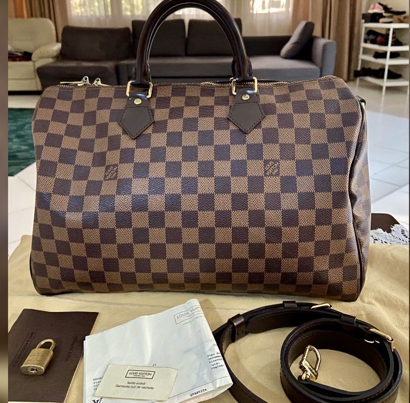Louis Vuitton Speedy 35 Mini Travel, Luxury, Bags & Wallets on Carousell