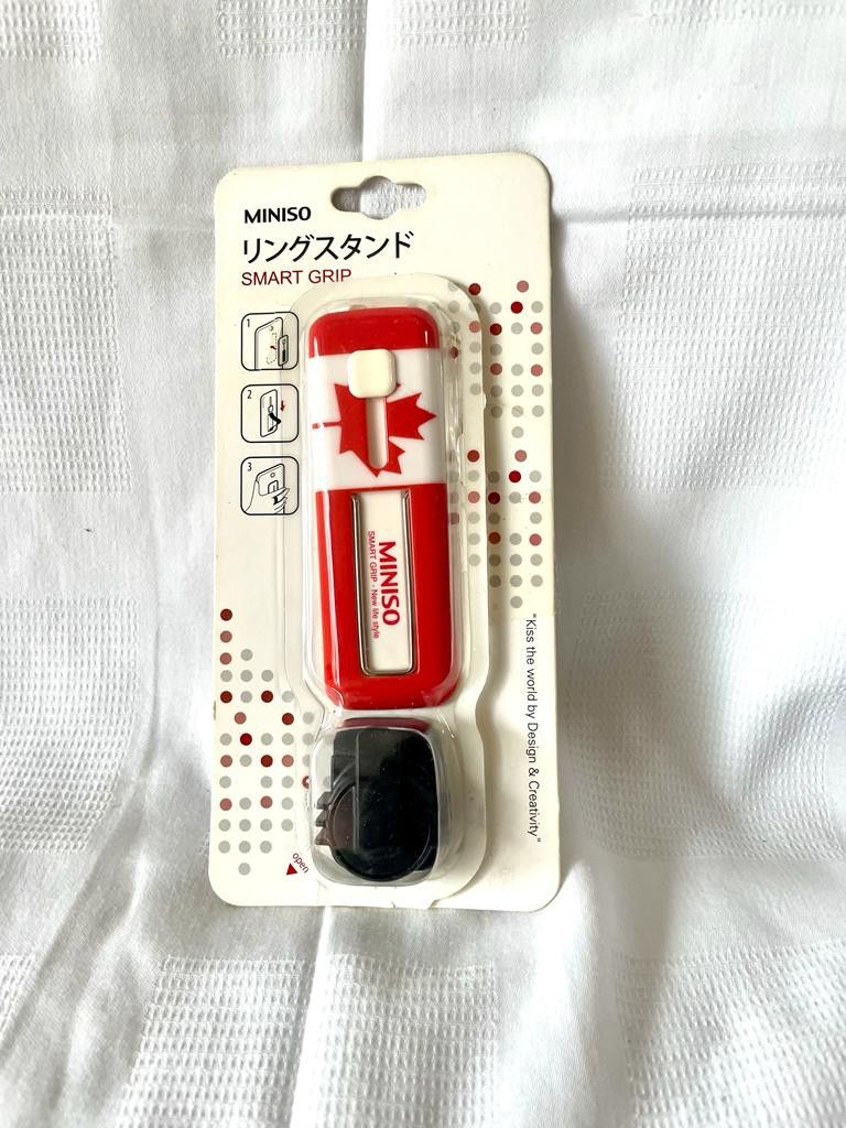 Phone Smart Grip (Category: Other Accessories) located in San Juan City. Submitted by stphilippines (Listing ID 1220643333, Image 1). Description: Miniso Phone Smart Grip • Unique design allows easy access to all buttons, controls and ports without removing the case • Offers appended security against scratches, dust, stains and moisture • Provides optimal protection without adding any bulk to your phone • Combines the durability and lightweight a