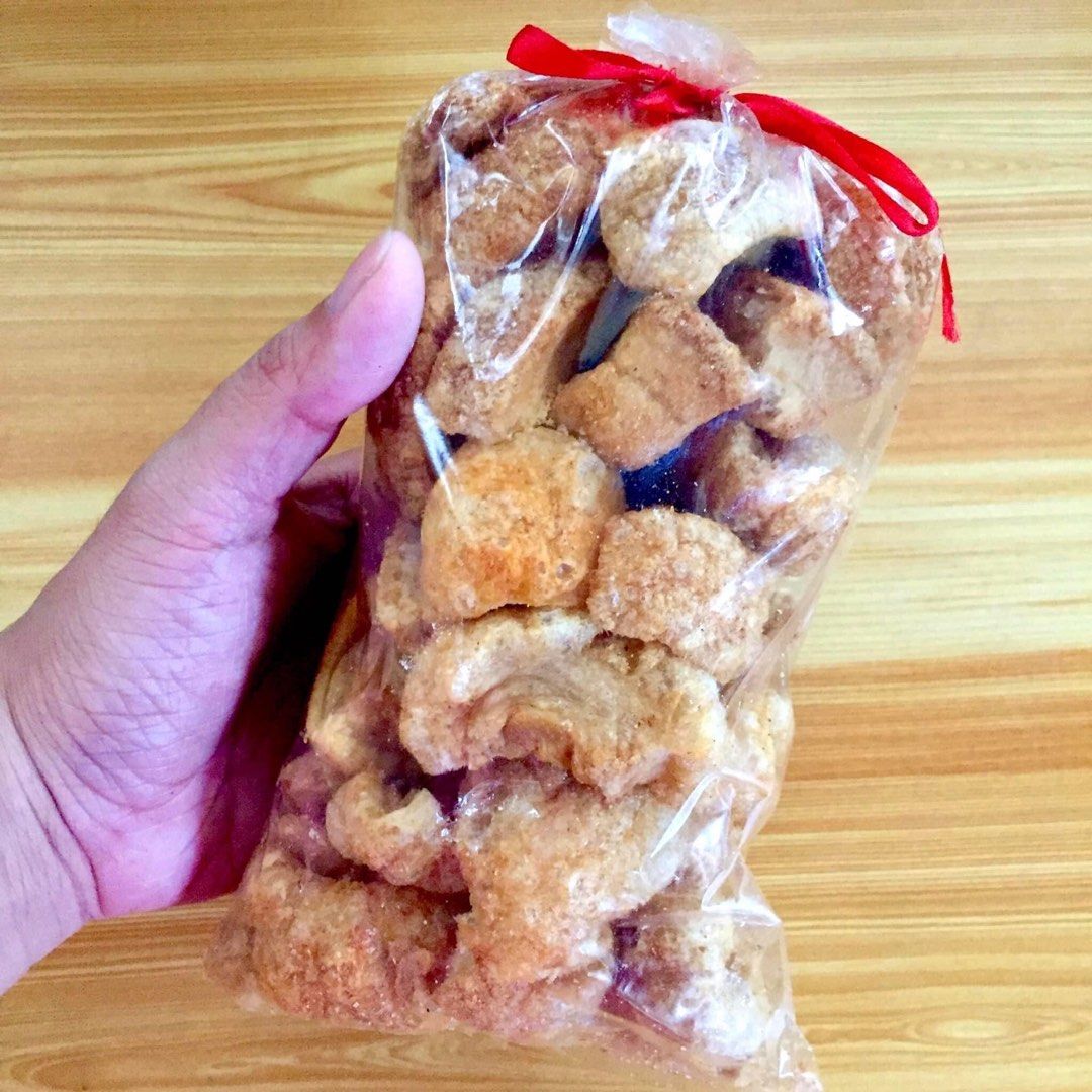 SPECIAL PORK CHICHARON NG BULACAN (Category: Packaged & Instant Food) located in Manila. Submitted by somethingblue02 (Listing ID 1220616963, Image 2). Description: 🐷🐷SPECIAL PORK CHICHARON NG BULACAN🐷🐷 ✨✨AVAILABLE NA PO ULIT!!!✨✨✨ Special Pork Chicharon (Regular) 150 pesos Special Pork Chichaton with Laman (Medyo Spicy) 100 pesos Location: PACO MANILA.