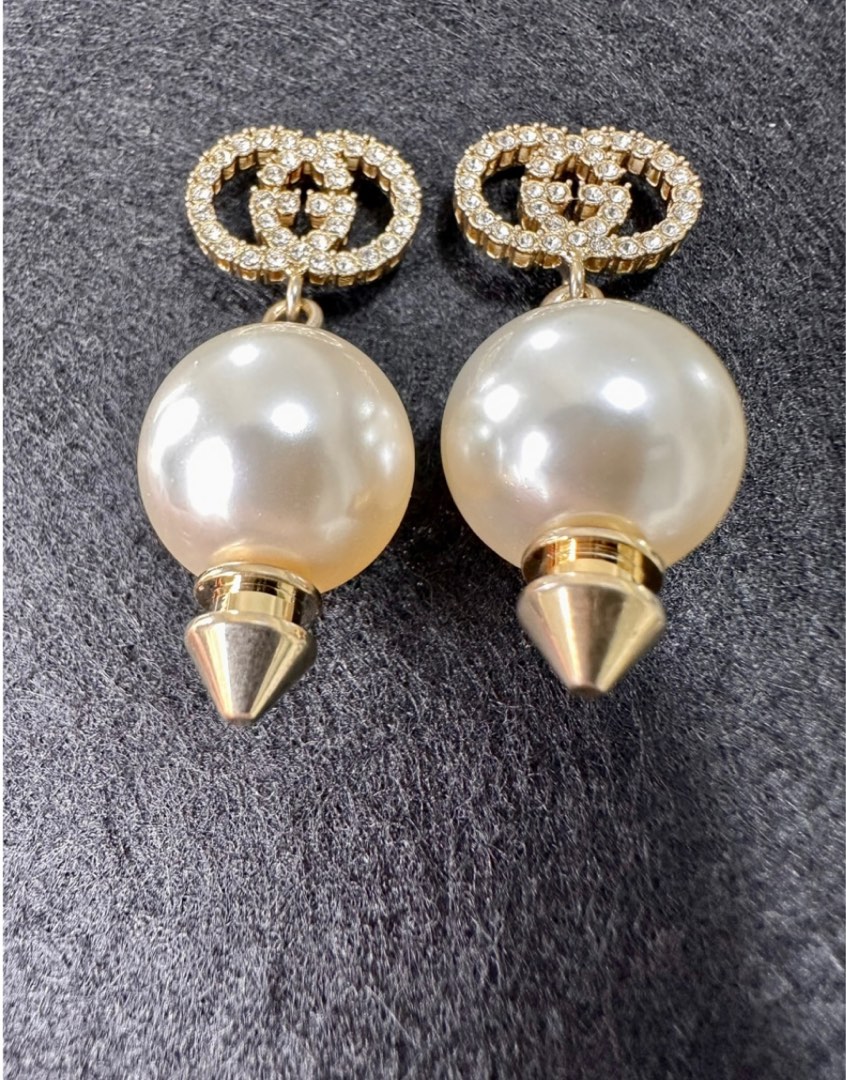 Interlocking g earrings with pearl deals