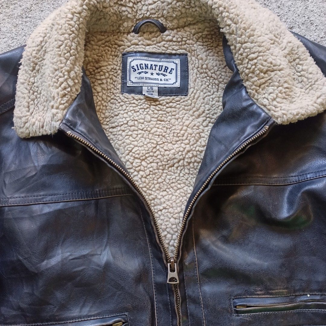 Levi's faux leather sherpa lined trucker jacket, Men's Fashion, Coats,  Jackets and Outerwear on Carousell