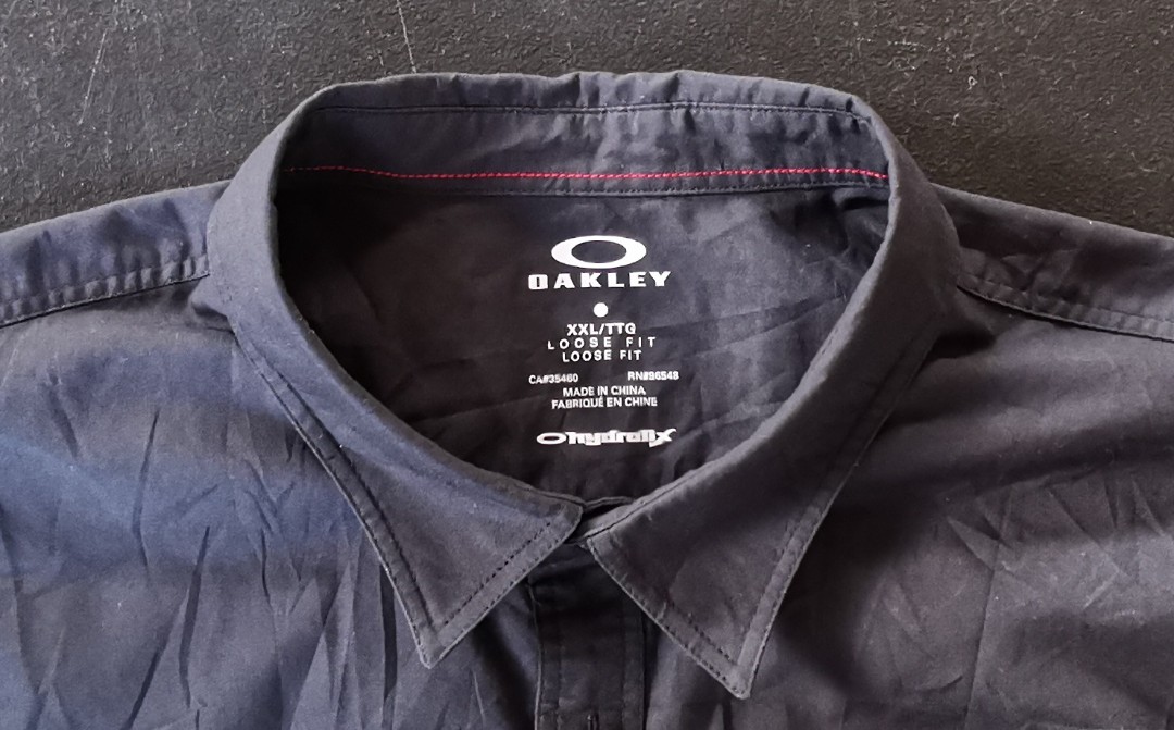 Oakley black, Men's Fashion, Tops & Sets, Formal Shirts on Carousell