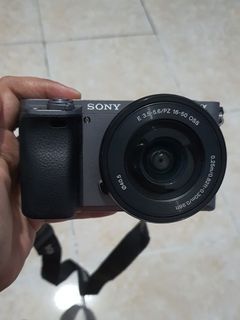 Sony a6000 (gray) with 16-50 mm kit lens & freebies