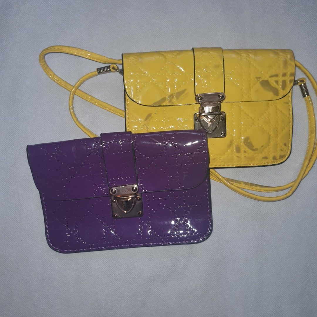 Pouches purple and yellow (Category: Purses & Pouches) located in Quezon City. Submitted by charott (Listing ID 1220817842, Image 1). Description: get both last price posted shipping: 👉j&t 👉 gogo express 👉grab/lalamove (within metro manila only 👉shoppee checkout (plus 15 pesos) Payment first basis.