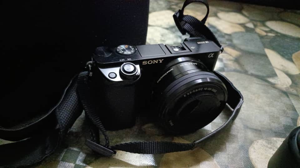 Sony a6000 + lens youngnuo 50mm f1.8, Photography, Cameras on Carousell