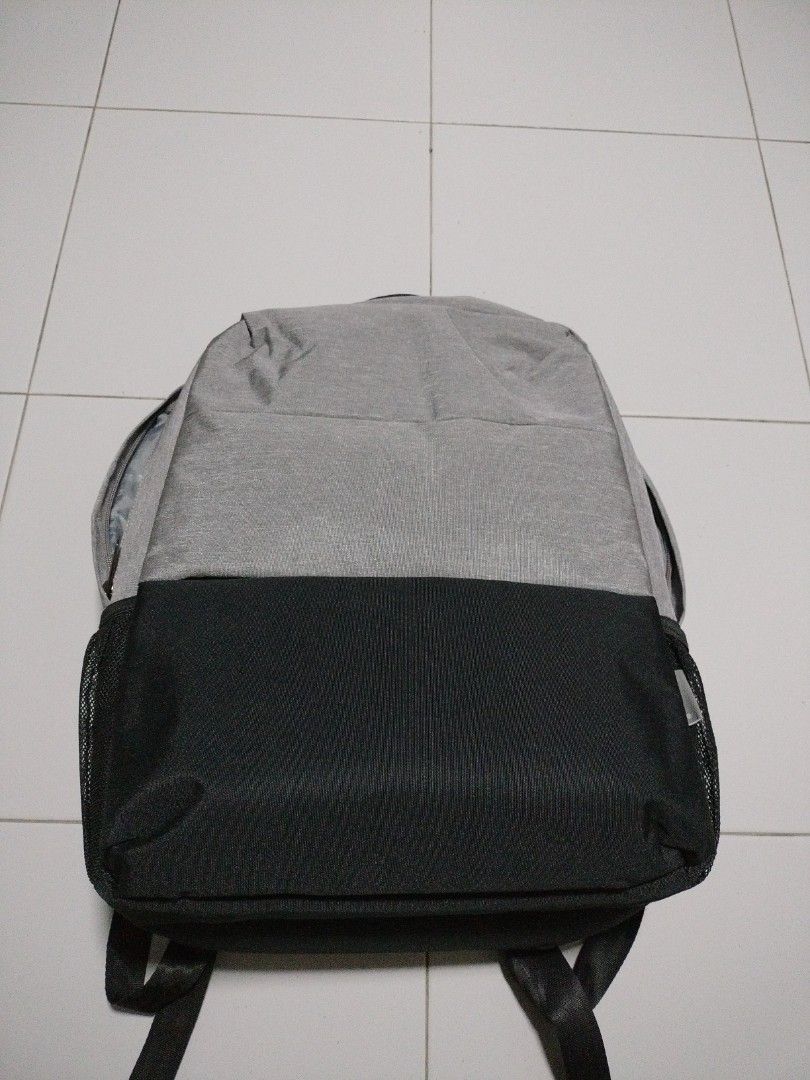 Work backpack (Category: Backpacks) located in Singapore. Submitted by cheeks70 (Listing ID 1220876164, Image 1). Description: - work backpack with many compartment for storage etc. - only used once or twice - waterproof material - with wallet for laptops and iPad - comes with outlet to connect your powerbank to charge your mobile equipment - price is nett and non return after sales - self collection at my address below.