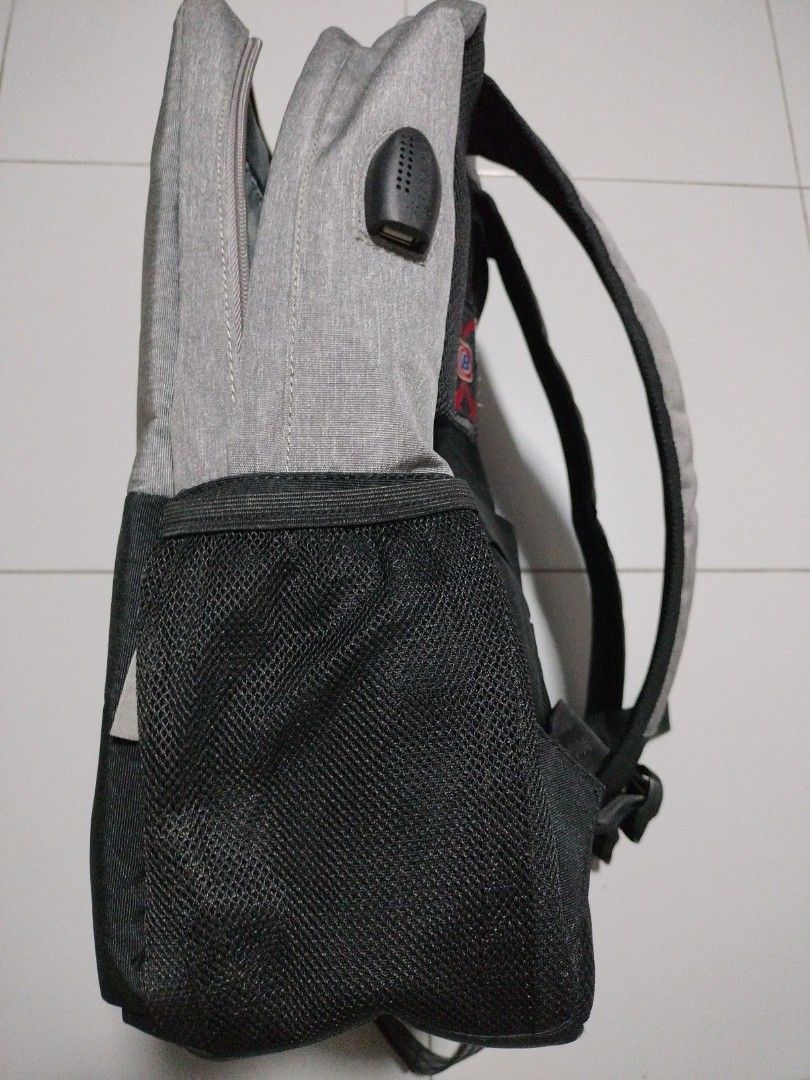 Work backpack (Category: Backpacks) located in Singapore. Submitted by cheeks70 (Listing ID 1220876164, Image 5). Description: - work backpack with many compartment for storage etc. - only used once or twice - waterproof material - with wallet for laptops and iPad - comes with outlet to connect your powerbank to charge your mobile equipment - price is nett and non return after sales - self collection at my address below.