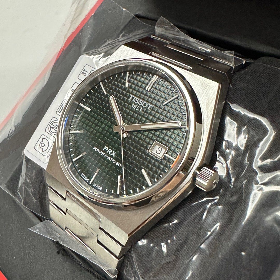 2023 Tissot PRX Powermatic 80 Green (Category: Luxury Watches) located in Makati City. Submitted by grail_luxury (Listing ID 1221077521, Image 2). Description: Brand New 2023 TISSOT PRX Powermatic 80 Green Dial ref. T1374071109100 UNWORN UNRESIZED COMPLETE INCLUSIONS Stickers still intact.