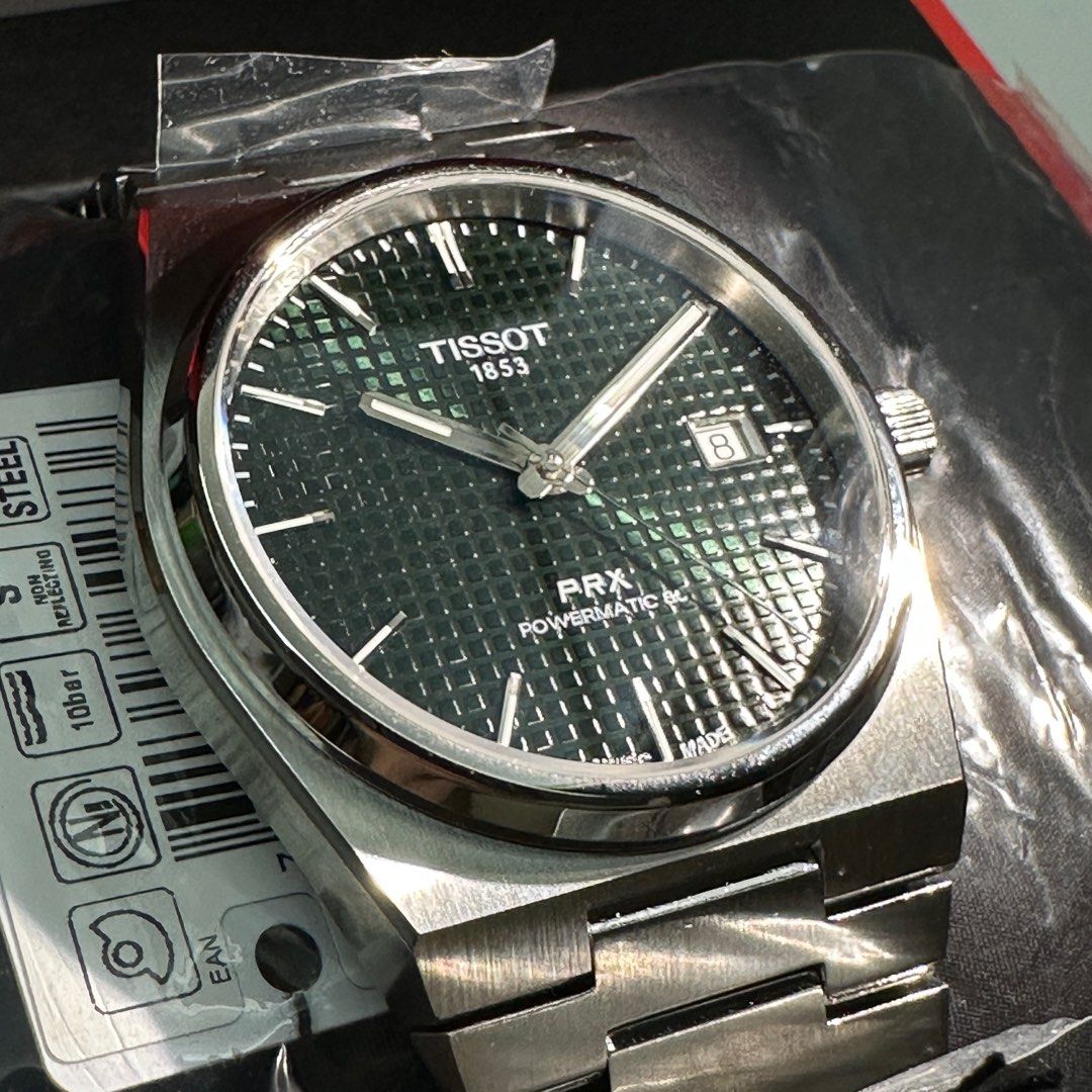 2023 Tissot PRX Powermatic 80 Green (Category: Luxury Watches) located in Makati City. Submitted by grail_luxury (Listing ID 1221077521, Image 3). Description: Brand New 2023 TISSOT PRX Powermatic 80 Green Dial ref. T1374071109100 UNWORN UNRESIZED COMPLETE INCLUSIONS Stickers still intact.