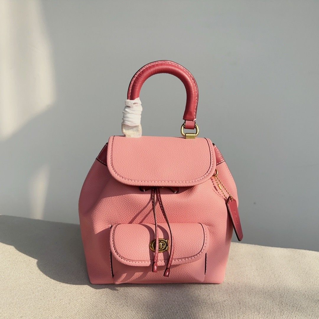 Light pink hotsell coach backpack