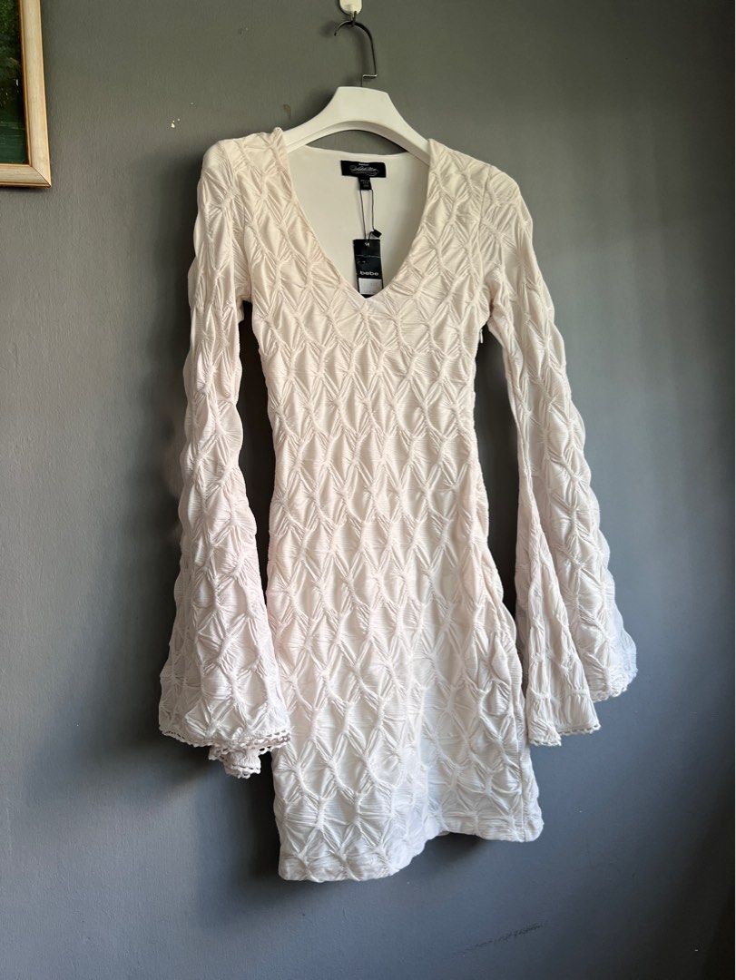 BNWT Authentic BeBe Addiction bell sleeve white dress Women s Fashion Dresses Sets Dresses on Carousell
