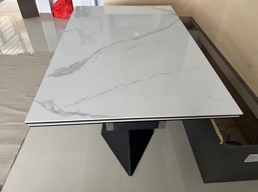 Dining Table (Category: Tables & Sets) located in Singapore. Submitted by t.chinwoon (Listing ID 1221050871, Image 2). Description: selling brand new marble dining table due to purchased wrongly cannot fit to my dining area. Only one side can be extend out. Dimension-L140cm extend tp L170com Thickness-6mm Width-90com Height-75cm self collect at my place,delivery if u buy the courier fee.