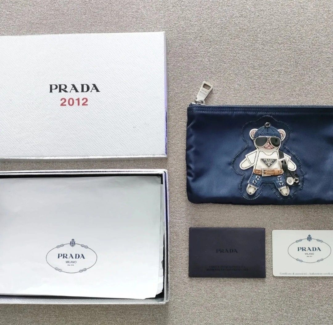 ?GENUINE PRADA TEDDY BEAR BLUE COLOR POUCH LIMITED EDITION FLAT. ?Made in  Italy, Luxury, Bags & Wallets on Carousell