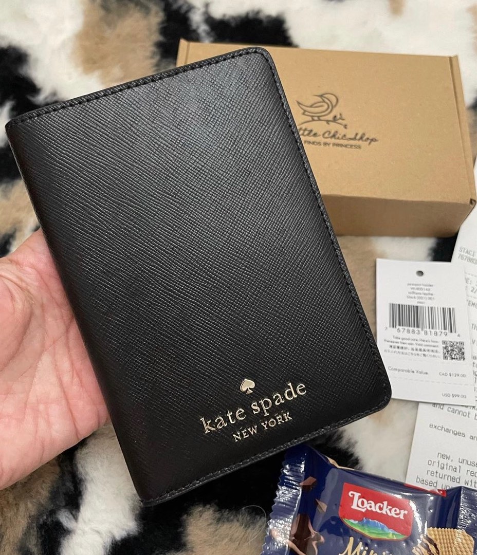 kate spade black passport holder on Carousell