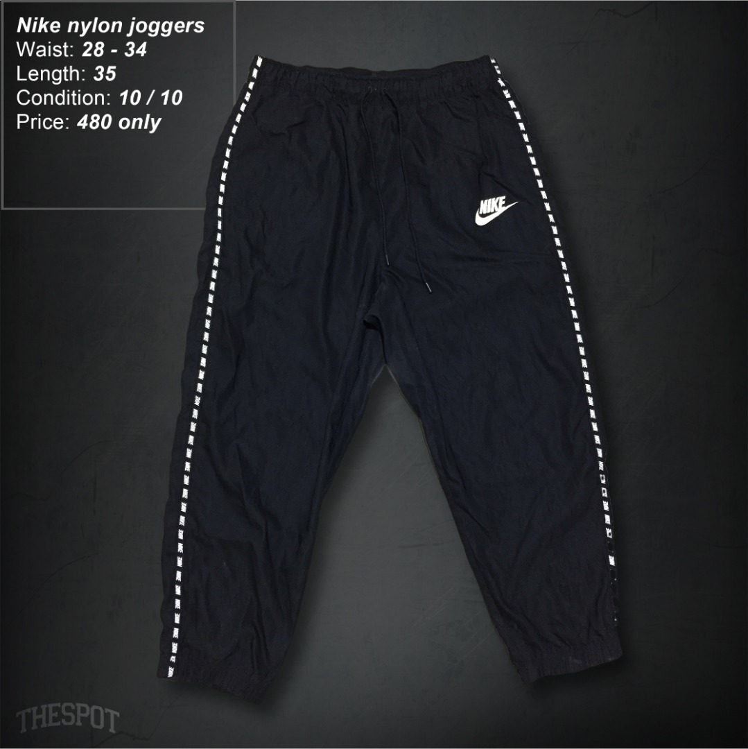 Nike tape repeat hotsell joggers