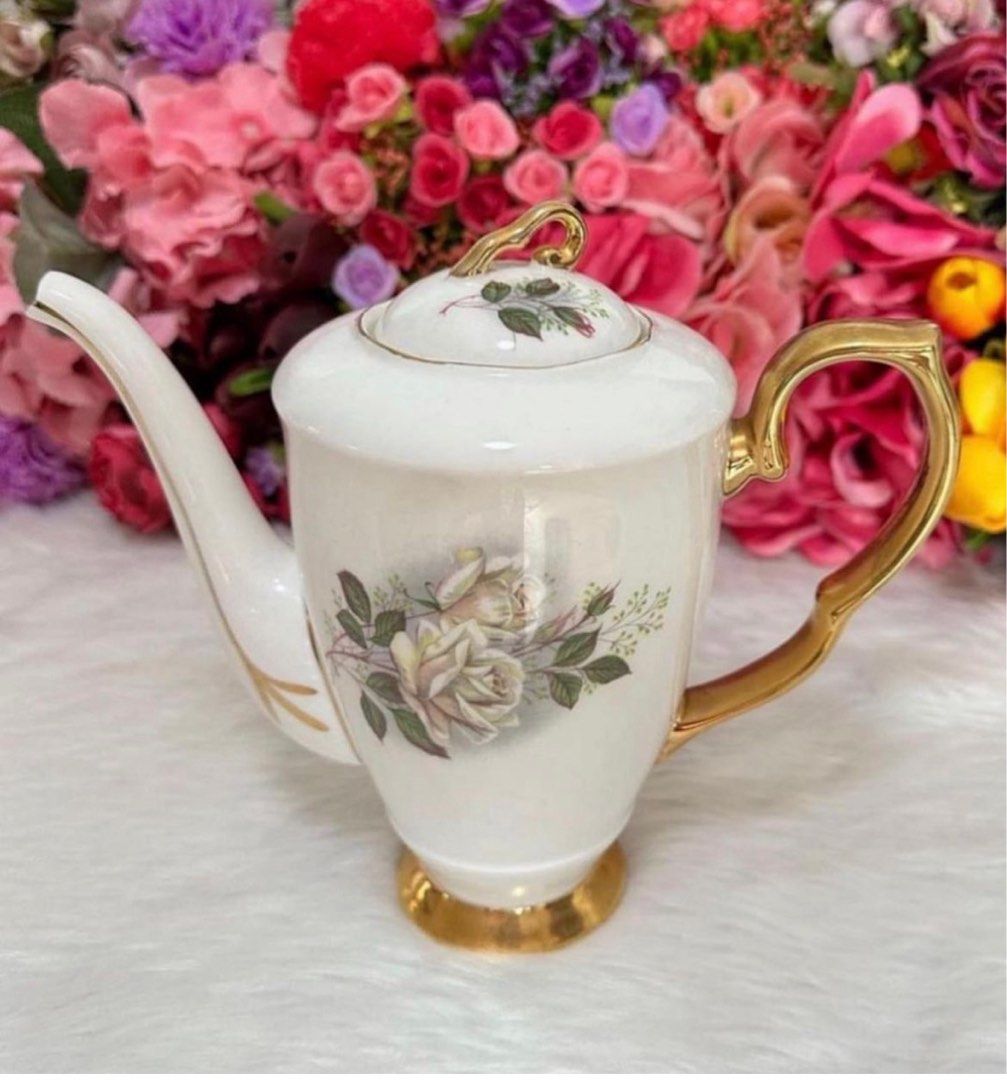 SALE!! Gladstone Coffee Pot (Category: Coffee & Tea Tableware) located in Pasig City. Submitted by glam_things (Listing ID 1220997257, Image 1). Description: SALE!! Gladstone Coffee Pot with thick gold band. Good condition. P3000 only. Send us a direct message to inquire💖 *Please note that we are selling vintage, antique and used pieces. These are not brand new and will show some signs of use and wear. They might have different back-stamps. You 