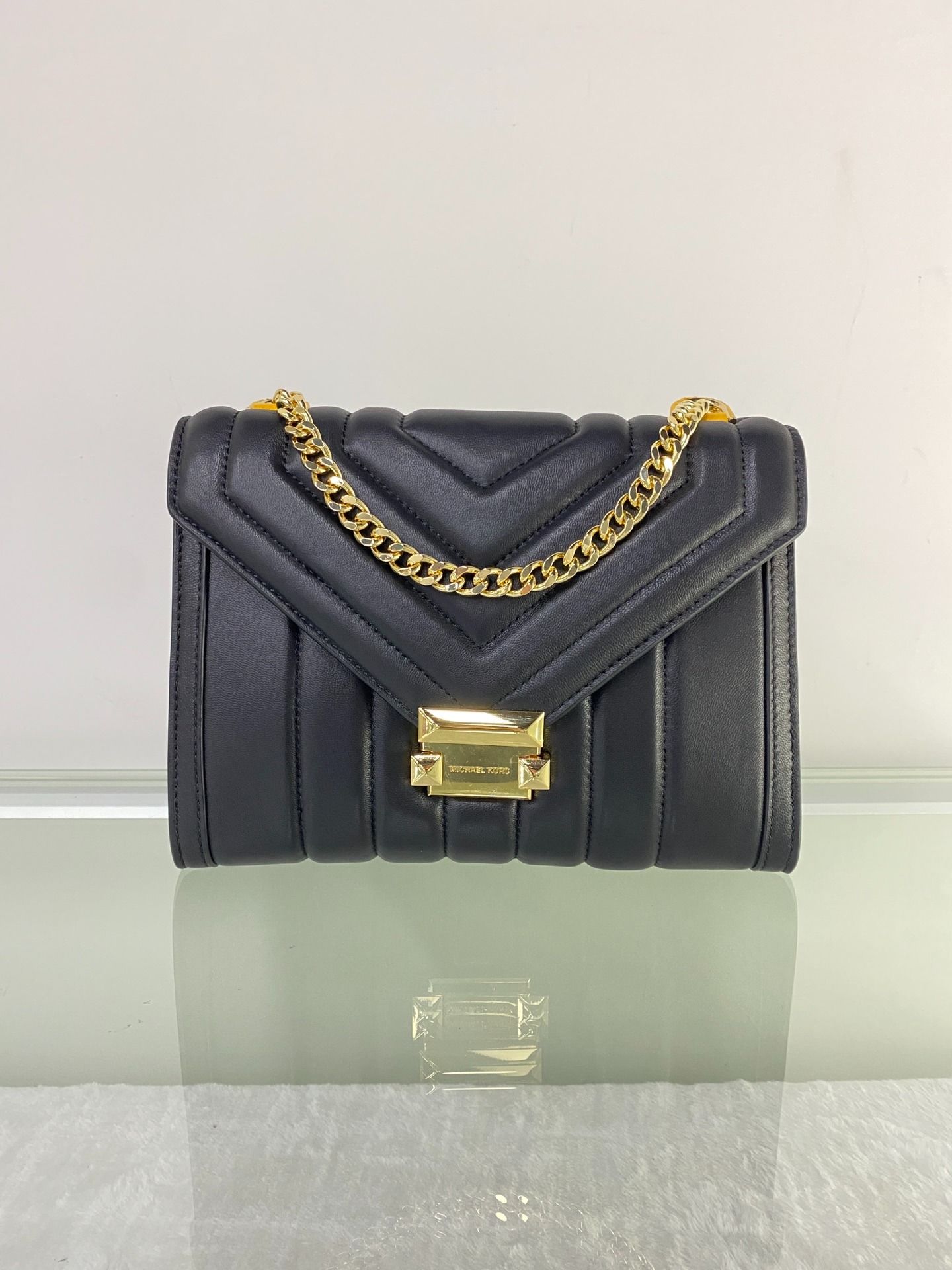 Red and black sale michael kors purse