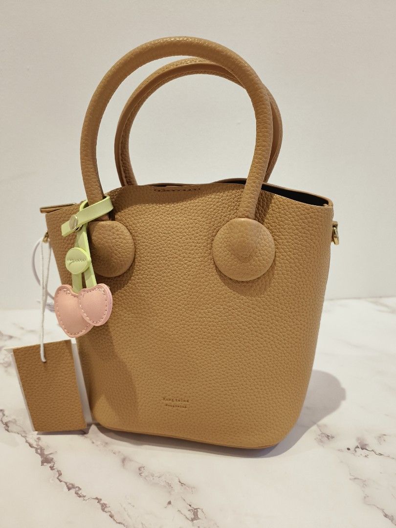 Cherry clearance tan bag