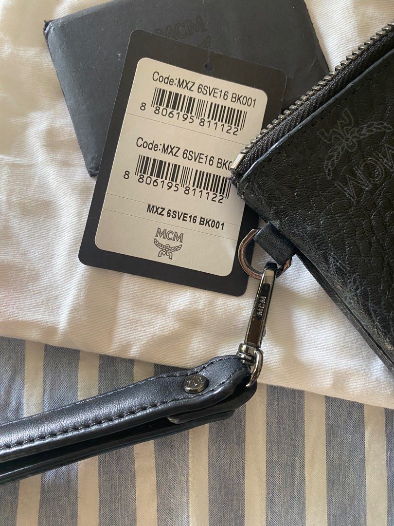 Mcm black outlet clutch bag