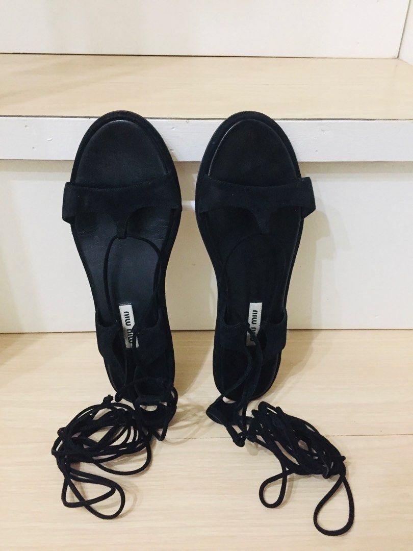 Miu miu black leather strappy flat sandals (Category: Flats & Sandals) located in Bocaue. Submitted by mjpvv (Listing ID 1221234500, Image 3). Description: Miu miu black leather strappy flat sandals Size 38 1/2 or 25 cm Money back guaranteed If proven fake No major flaws With free dust bag Straps are adjustable No return no exchange all sales are final.