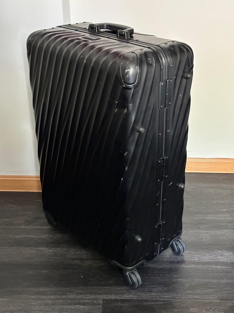 Tumi 19 degree aluminum extended outlet trip packing case
