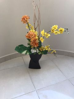 Artificial flower with porcelain vase