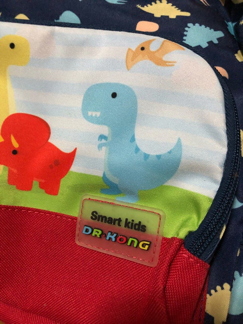 Backpack (Category: Diaper Bags & Wetbags) located in Singapore. Submitted by kes_mama (Listing ID 1221400177, Image 3). Description: - Brand new Dr Kong haversack - Cute dinosaur prints - suitable for kids 1.5 - 4yo - 1 large compartment with 1 zipper front pocket - 2 side net pockets .