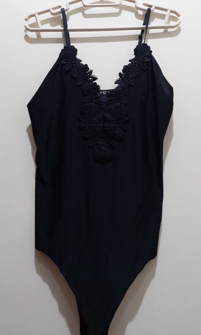 Black Floral Embroidered Bodysuit (Category: Sleeveless) located in Cavite. Submitted by clutterbug15 (Listing ID 1221433106, Image 2). Description: No flaws still in good condition Can fit M-L.