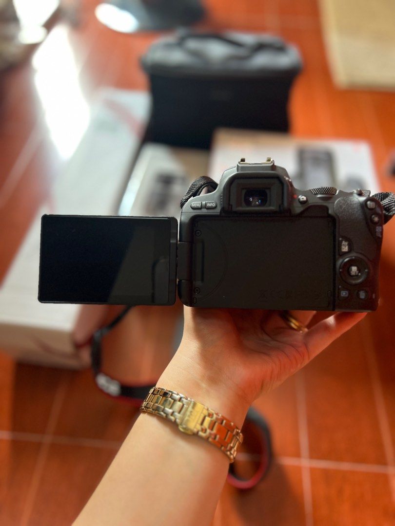 Canon EOS 200D (Category: Cameras) located in Quezon City. Submitted by treeshabertol (Listing ID 1221296360, Image 3). Description: Set includes: 1x Camera 2 x Lenses: EF 75-300mm f/4-5.6 III EF-S 18-55 III 1 x tripod 1 x camera bag 1 x battery 1 x charger RFS: barely using it; prefers an action cam.