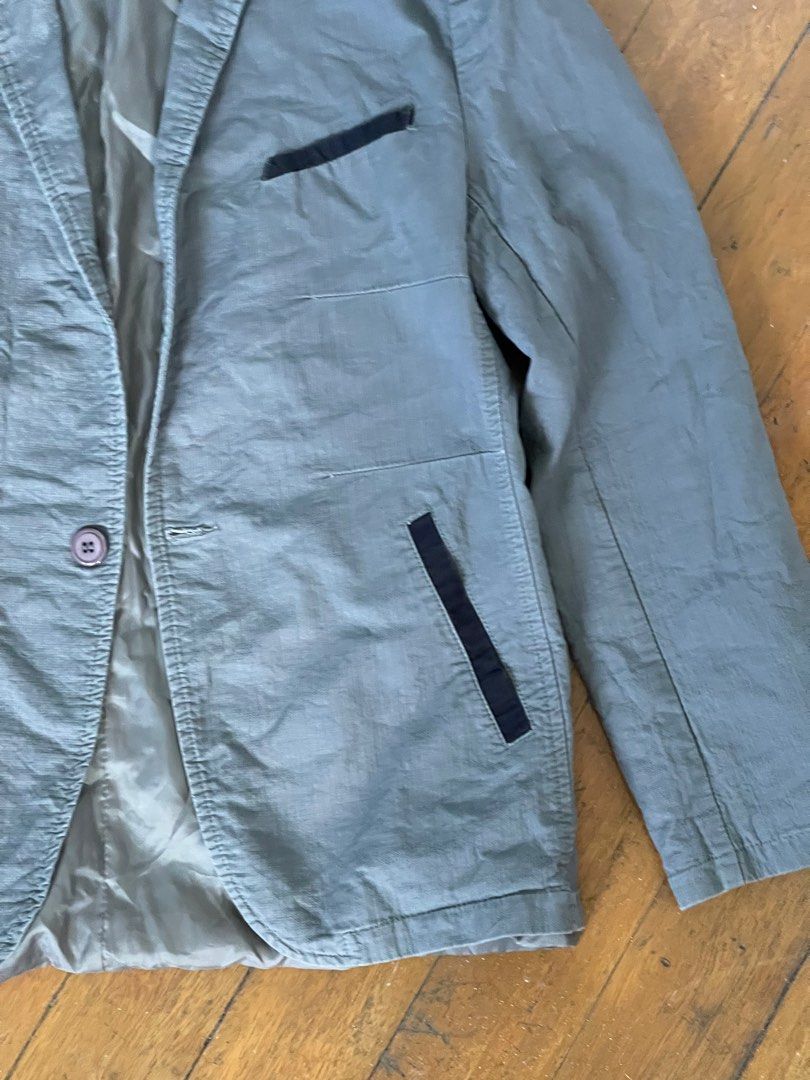 onesimus coat and tie