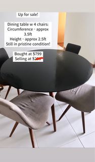 Round dining table with chairs