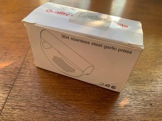Stainless steel garlic press
