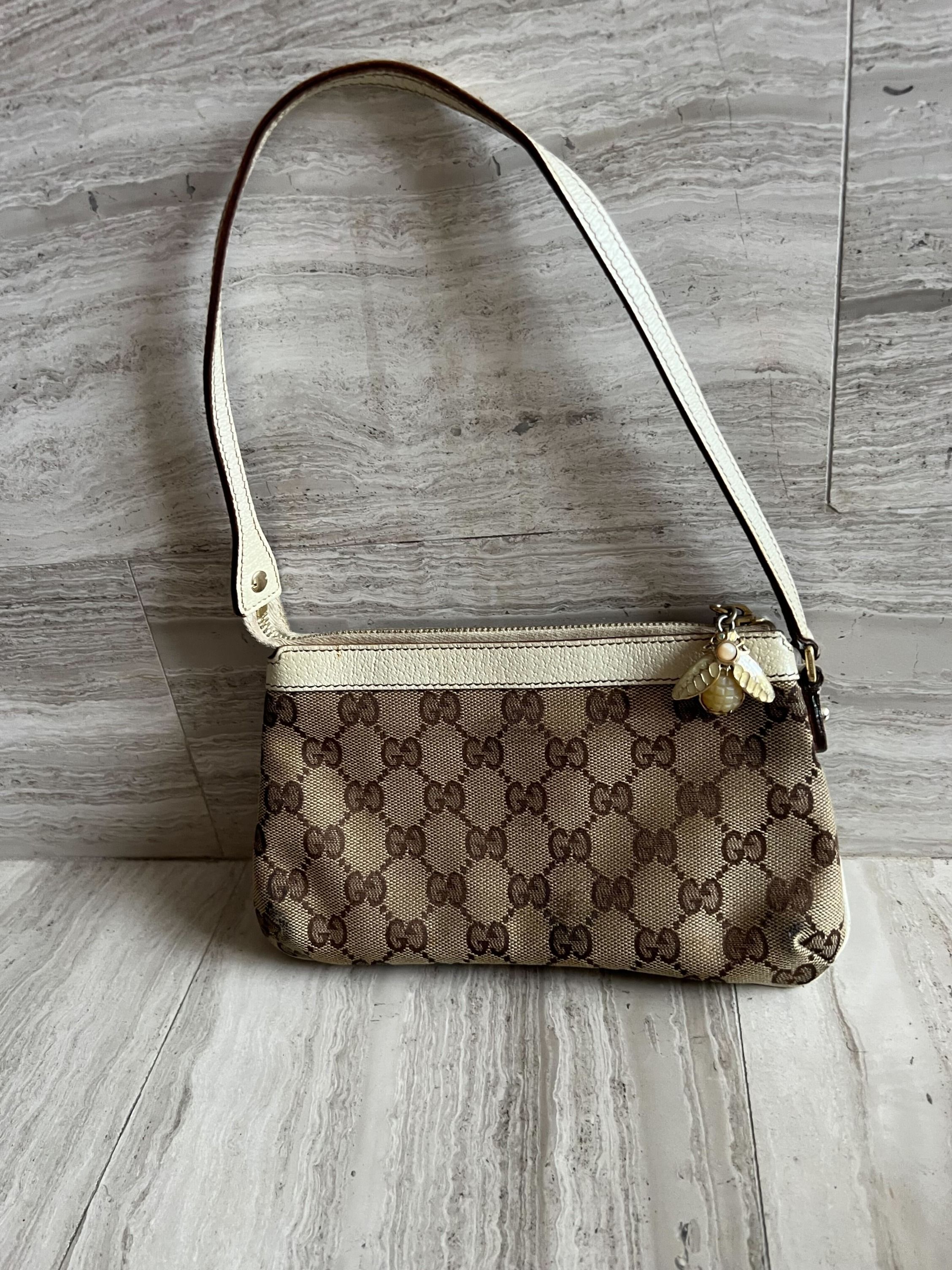 GUCCI Monogram Bumble Bee Charm Pochette, Luxury, Bags & Wallets on  Carousell