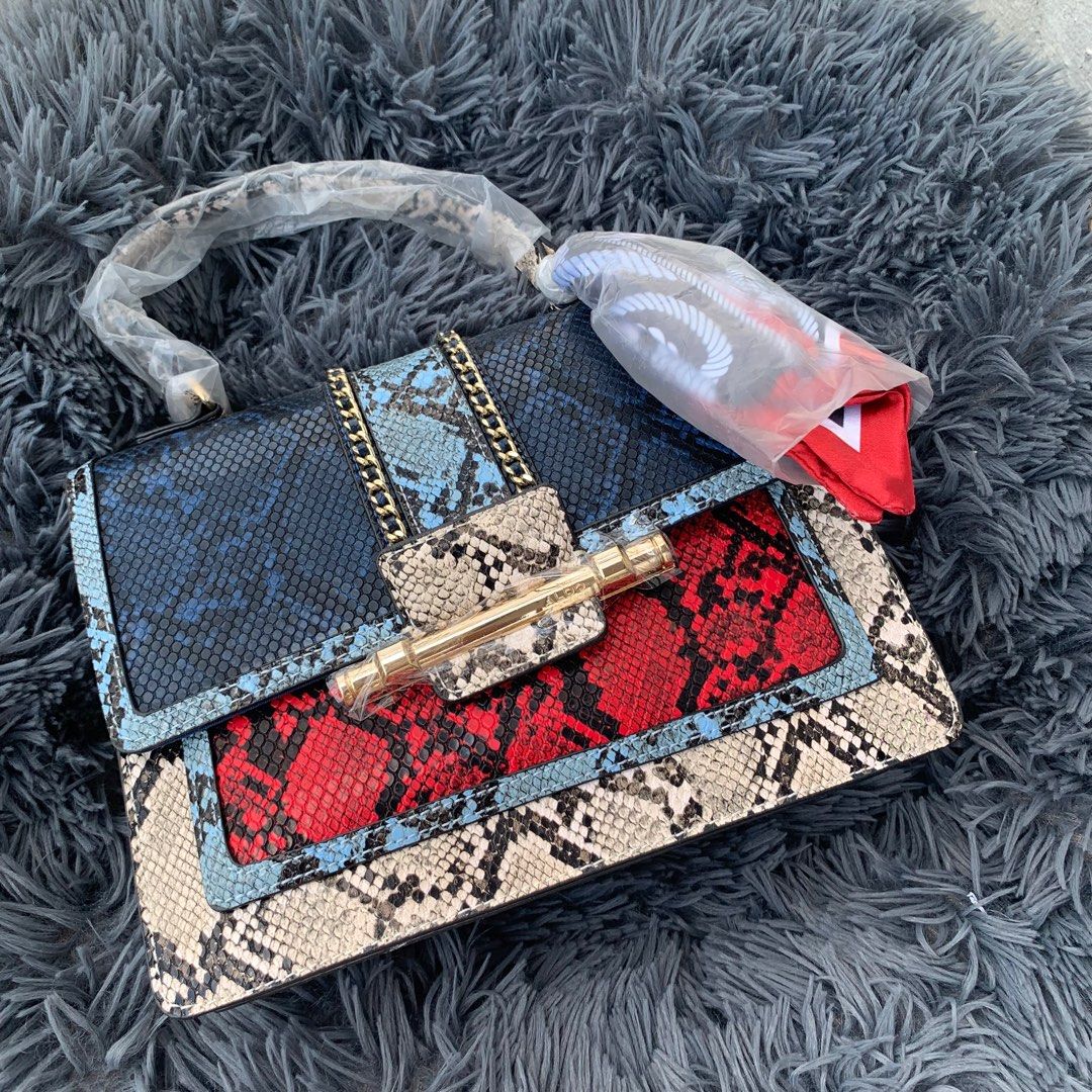 Aldo snake purse deals