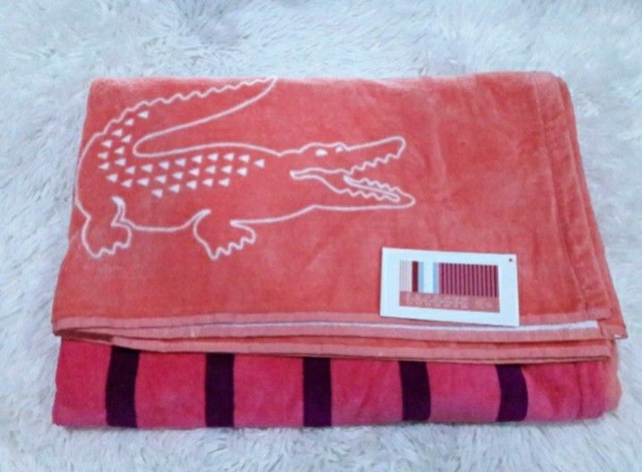 lacoste beach towel (Category: Bathtub & Bath Accessories) located in Quezon City. Submitted by jadeonlineshop (Listing ID 1221602796, Image 1). Description: lacoste beach towel 💯original and brand new from usa on hand sa pinas.