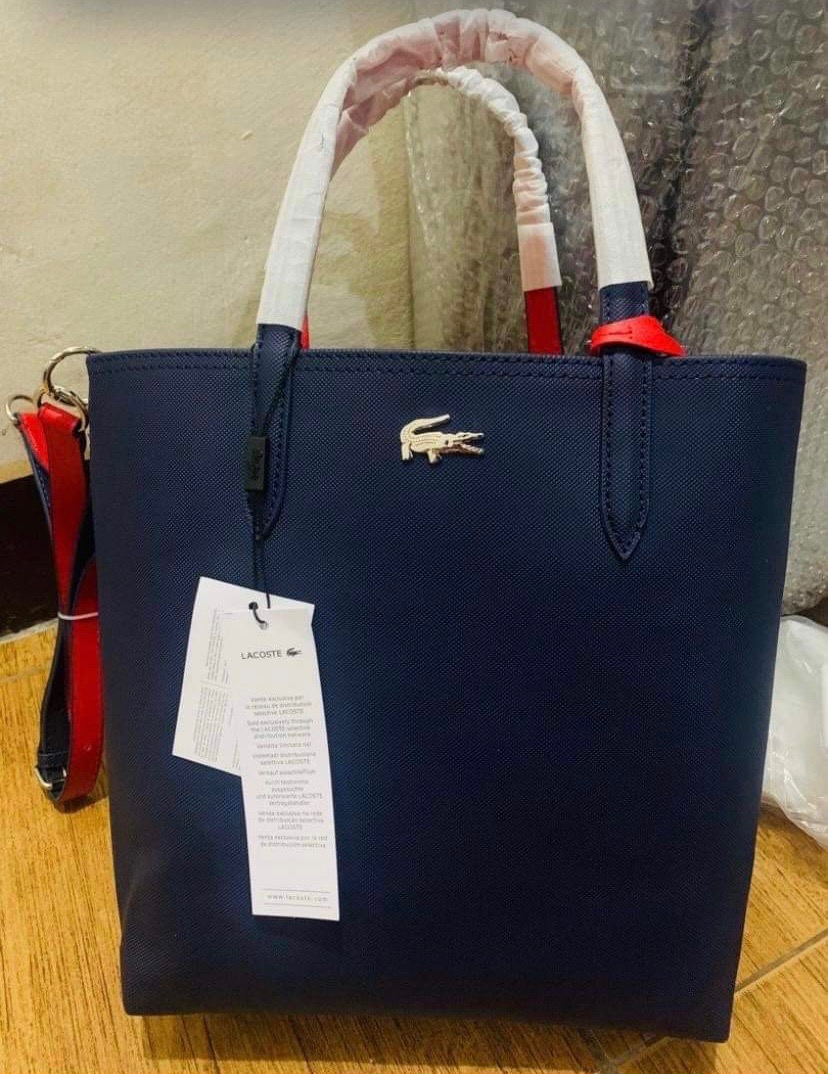 Lacoste reversible bag blue/red on Carousell
