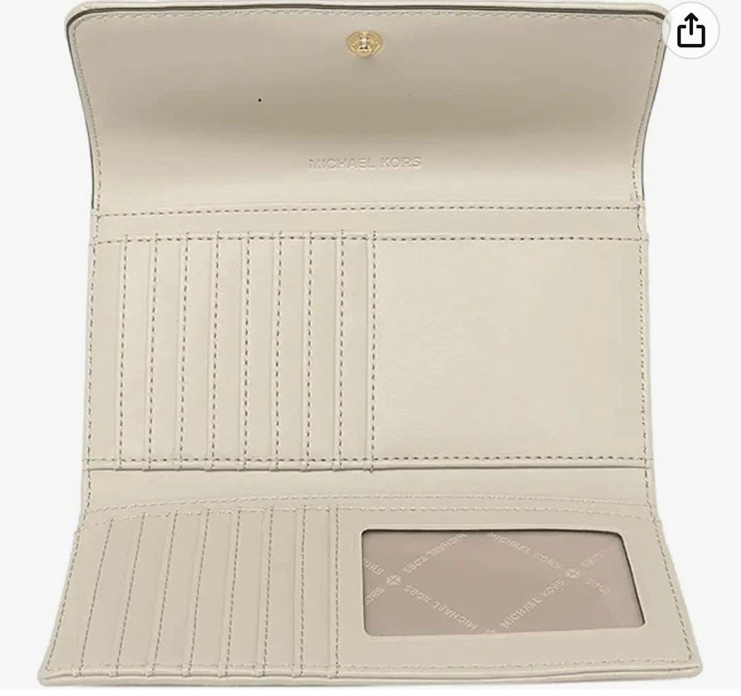 Michael Kors (Category: Luxury Bags & Wallets) located in Del Monte. Submitted by loryelletee (Listing ID 1221510684, Image 2). Description: Michael Kors Jet Set Travel Trifold Wallet Vegan Leather Color: Light Sand Brand new with tag 100% Authentic Fresh from U.S On hand Php: 3,200 Michael Kors Jet Set Travel Large Trifold Wallet Vegan Leather 7'' L x 4'' H x 1'' D Vegan material Interior: 1 Window ID, 4 Banknote Slots, 17 Credit Card Slots Pres